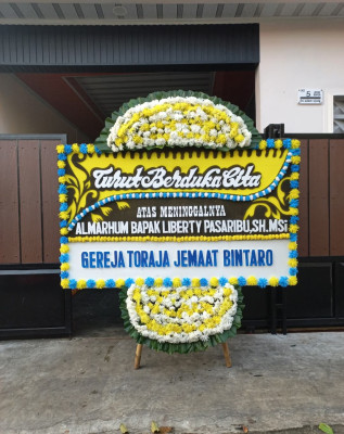 Papan Bunga Duka di Kawo