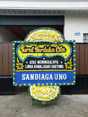 Papan Bunga Duka di Kawo